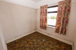 Bedroom Three- click for photo gallery